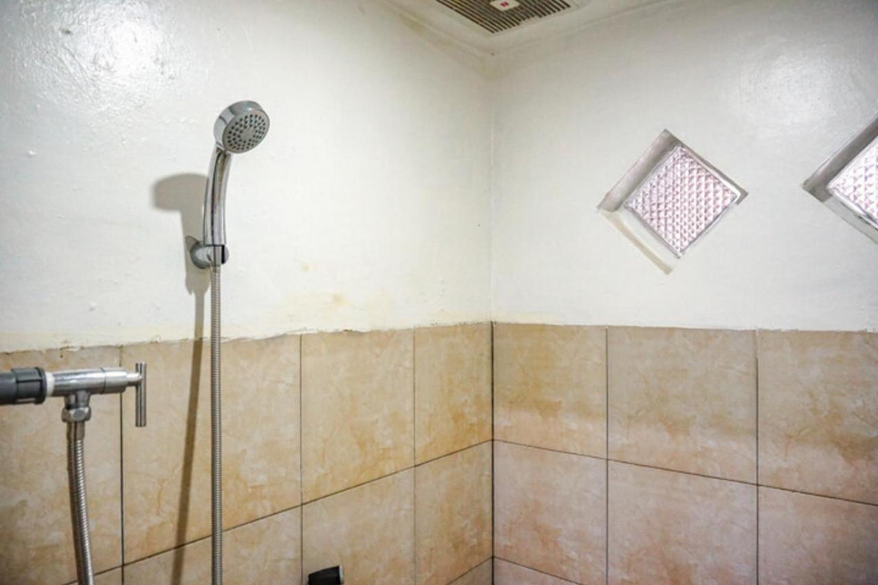红多兹酒店-近新加拉惹佩尼班甘海滩 外观 照片